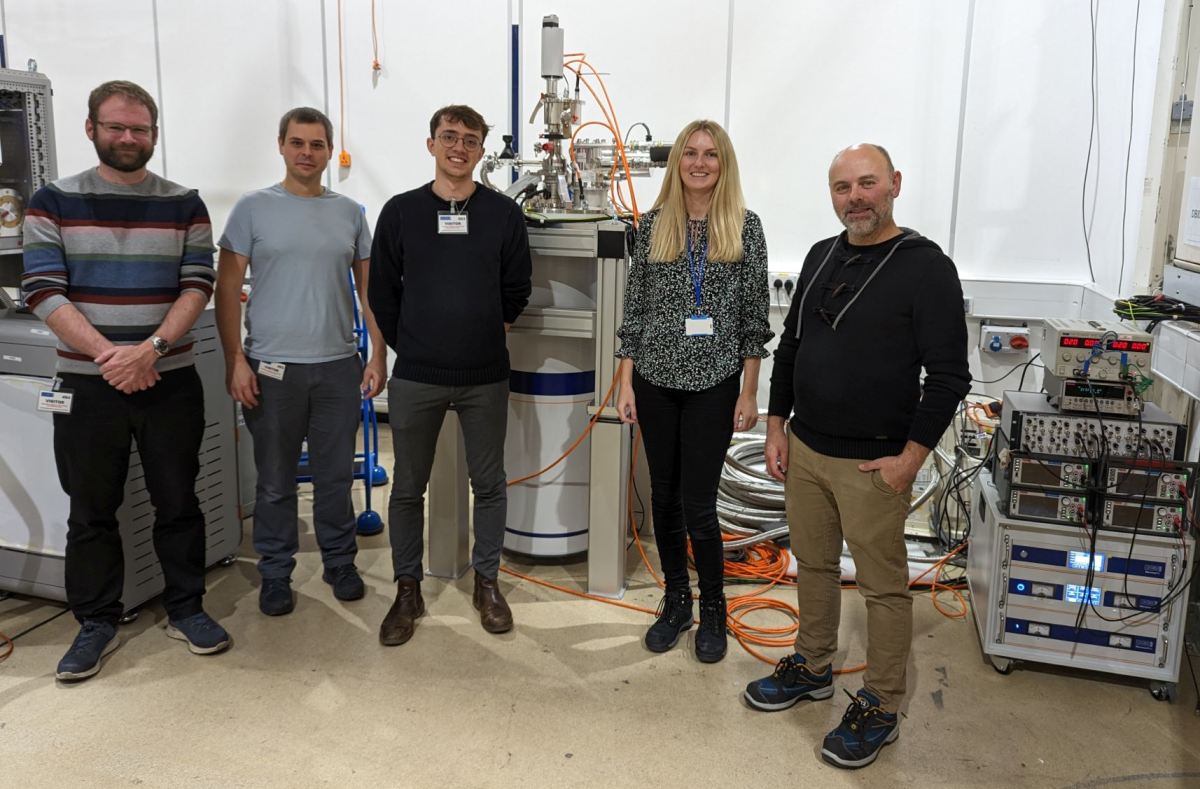 The Lancaster University team in the Apps Lab (from left to right Dr. Michael Thompson, Prof. Jonathan Prance, and George Ridgard) with Abi Graham and Ben Yager from Oxford Instruments NanoScience.  The Lancaster University team in the Apps Lab (from left to right Dr. Michael Thompson, Prof. Jonathan Prance, and George Ridgard) with Abi Graham and Ben Yager from Oxford Instruments NanoScience.
